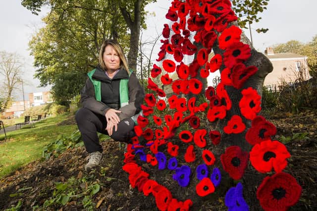 Kimberly Parry, from Cleckheaton in Bloom, with her crocheted poppy display
