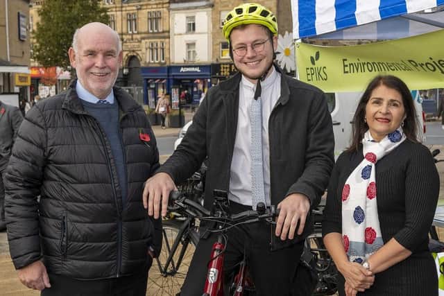 Councillors Eric Firth, Will Simpson and Naheed Mather pictured with an electric bike from Environmental Projects in Kirklees