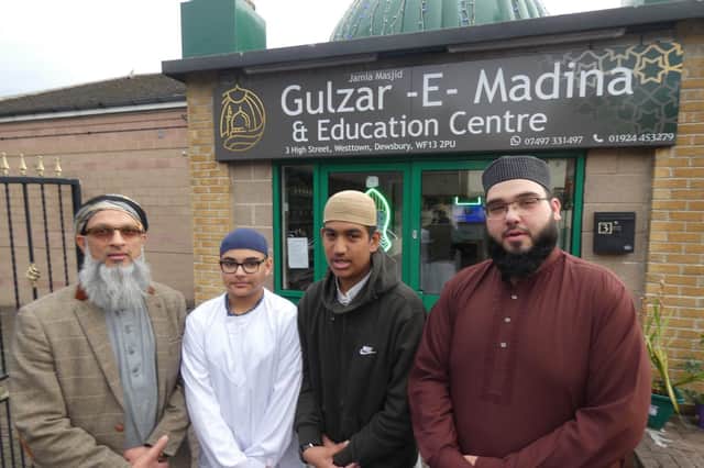 Representatives outside the Gulzar-E-Madina Jamia Mosque in Westtown, Dewsbury