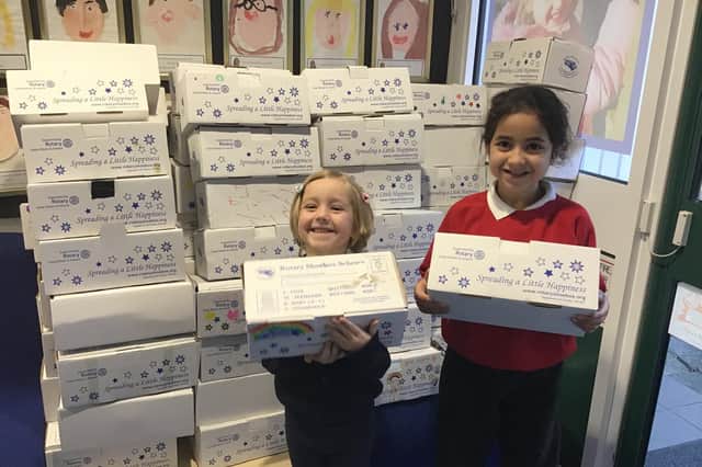 Children at Crossley Fields Junior and Infant School in Mirfield with the shoeboxes