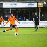 Laurence Sorhaindo scores from the spot for Brighouse Town against Frickley Athletic. Picture: Jim Fitton