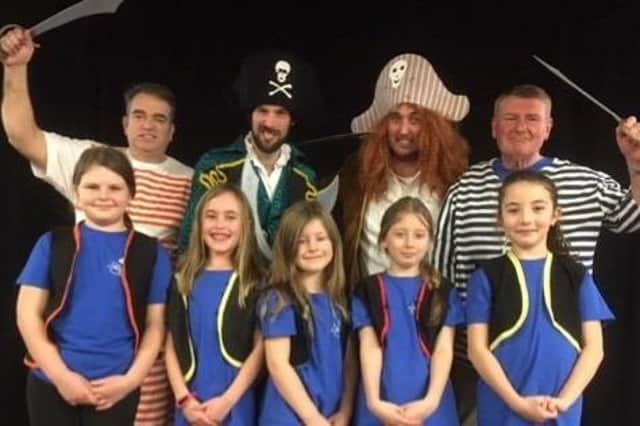 Cast members of Mirfield Parish Team Pantomime's production of Treasure Island. Back row from the left are Alex Bass, Paul Blakeley, Dan Smith and Graham Ervine. Front row from the left are Connie Hudson, Taylor Smith, Violet Learie, April Crawshaw and Matilda Abed