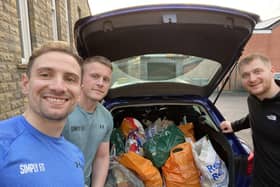 Some of the Simply Fit team packing up donations for Cleckheaton Food Bank