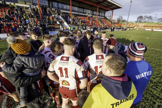 Thornhill Trojans huddle after their match against Doncaster in the Challenge Cup in 2020. They could meet them again in the competition in 2022.