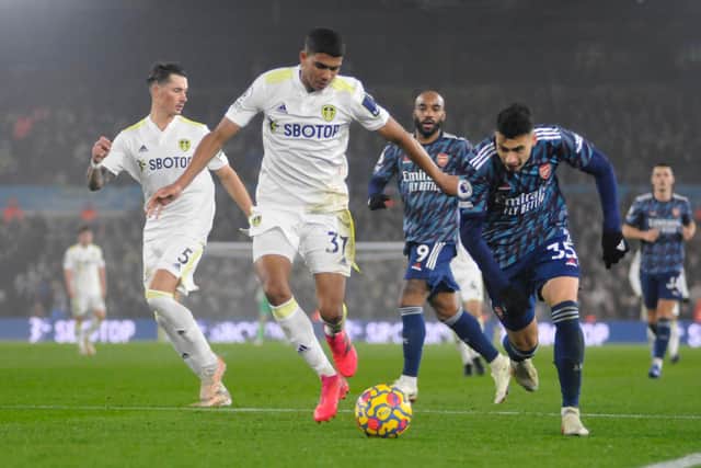 Leeds United's young defender Cody Drameh comes up against young Gunner Gabriel Martinelli.