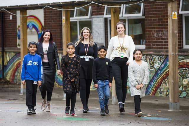 Pictured from the left at Boothroyd Primary Academy in Dewsbury are Mubashir Yaqoob, nine, head teacher Kirsty Stubbs, Zara Yasim, eight, assistant head Helen Bartle, Irfan Barucha, eight, teacher Phoebe Ayling and Anam Hussain, eight