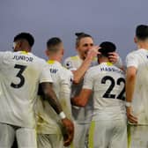 Leeds United players celebrate Jack Harrison's opening goal in the 3-1 win over Burnley.