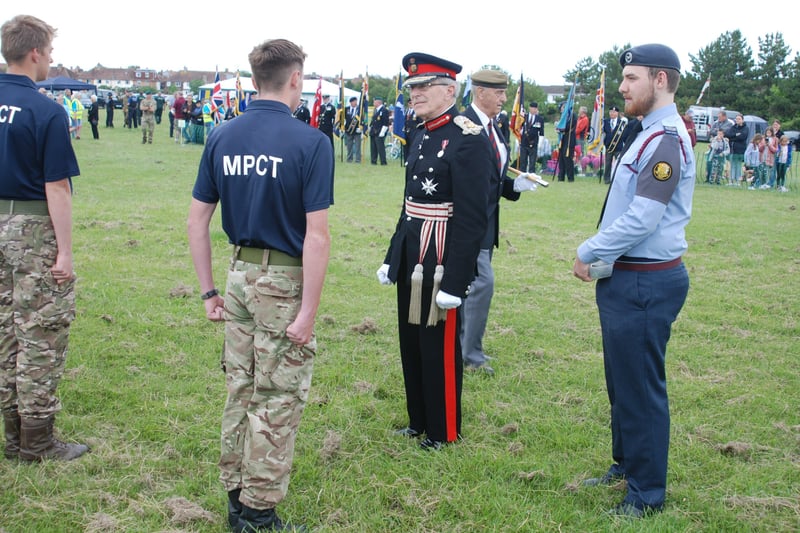 Eastbourne Amred Forces Day. Lord Lieutenant Peter Field chatting to members of MPCT Eastbourne. Picture by Bob Newton. SUS-210628-122621001