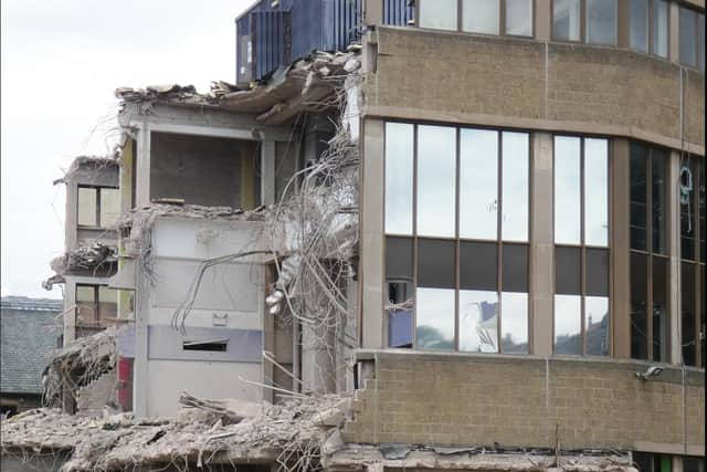 The Former Dewsbury College main reception building getting torn down.