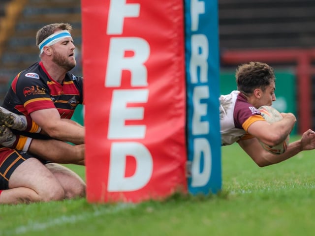 Amir Saghir dives over for a try for Dewsbury Moor Maroons A in their final.