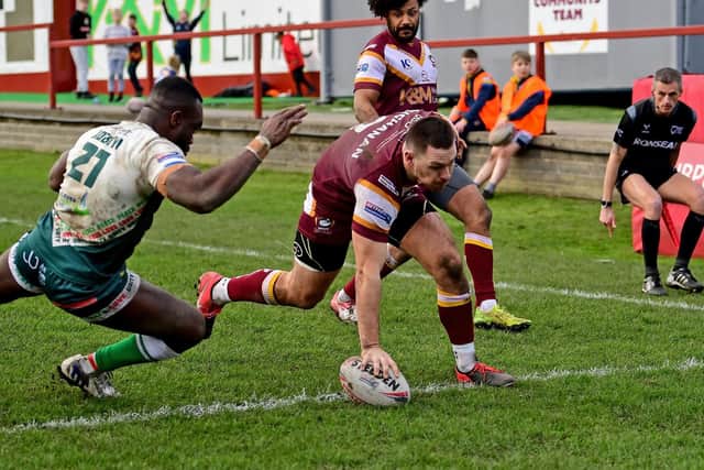 Kieran Buchanan scored two quickfire tries in the second half to put the Bulldogs back in front in a dramatic game with Keighley Cougars.