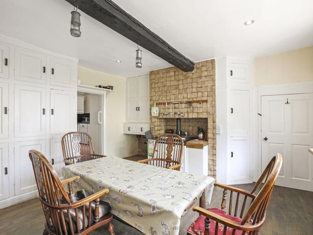 A gas Aga takes pride of place in the kitchen, that has a pantry, and access to the cellar.