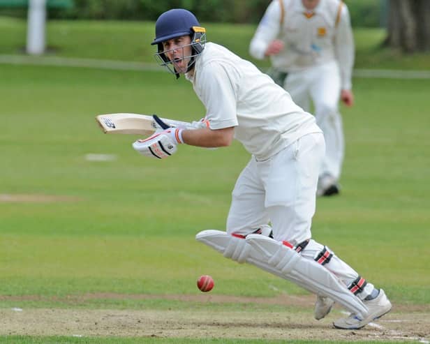 Sam Frankland's 74 saw Woodlands through to the semi-finals of the Heavy Woollen Cup.