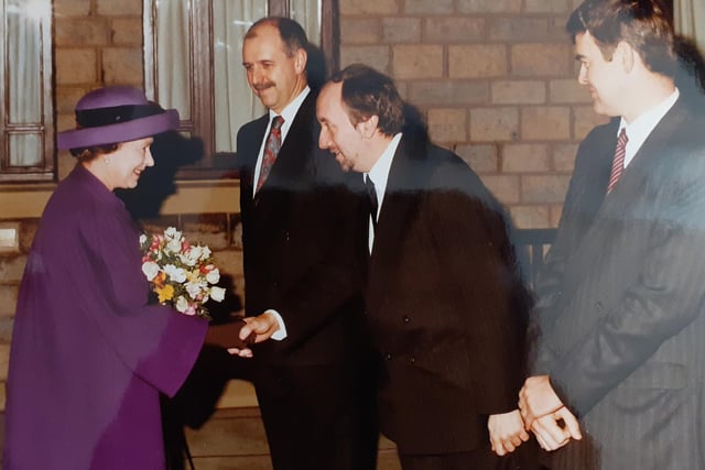 Queen Elizabeth II being greeted at Claremont House.