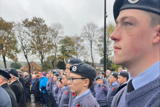 The youngsters braved the weather conditions as they paid their respects to those who have died in military conflicts.