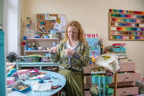 Dorset Button maker Gini Armitage working in her home studio, who has revived the ancient craft tradition