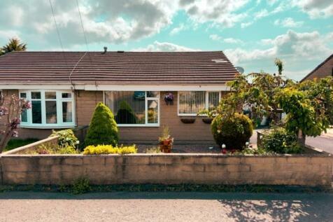 This charming two-bedroom bungalow is avaible for offers in the excess of £190,000.