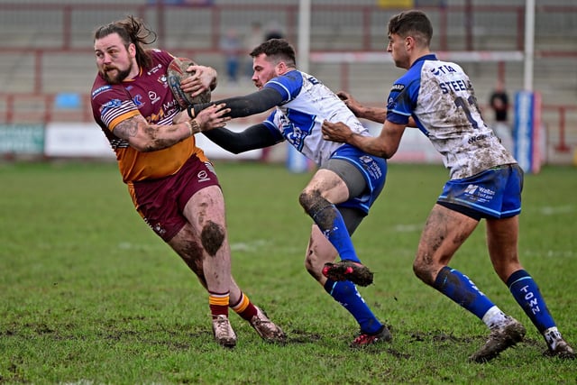 Batley Bulldogs' Michael Ward shrugs off a tackle in the Challenge Cup victory over Workington Town.
