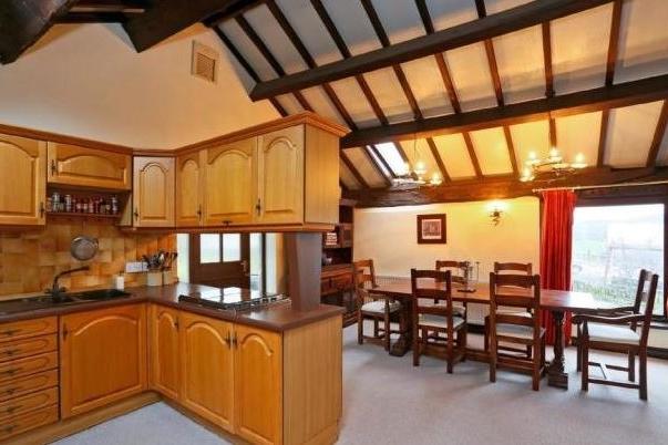 The kitchen and dining areas on the first floor of The Oaken Barn