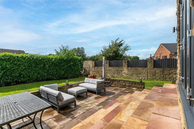 A large patio seating area is ideal for al fresco dining or for entertaining.