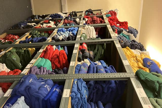 School uniform packed on the shelves at the Uniform Exchange warehouse in Lockwood, Huddersfield. (Photo credit: Andy Hirst from AH! PR)