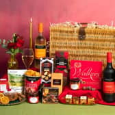 The Luxury Gift Basket, priced at £95, which includes fine wine, biscuits, handmade mini cakes.