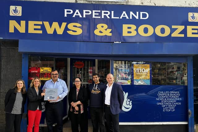 Pictured outside Paperland in Cleckheaton are Wendy Cowell, of Camelot; Batley and Spen MP Kim Leadbeater; Kawal and Suman Devasher, owners of Paperland; Viney, of Paperland; and Karl Southworth, of Camelot