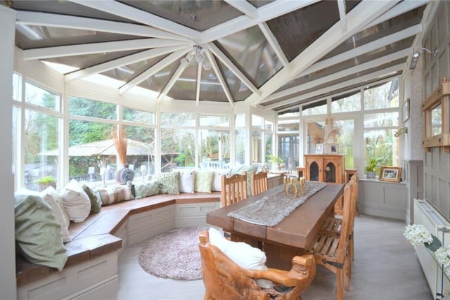 A large and sunny conservatory, or garden room.