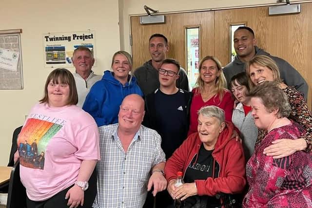 Ms Leadbeater with Batley and District Mencap members.