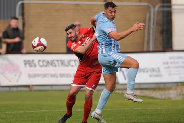 Joe Walton battles for the ball with James Williamson in Liversedge's game at Bridlington Town. Photo by Dom Taylor