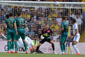 Tarik Muharemovic scores with an overhead kick for Leeds United against Augsburg.