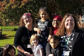 Staff and pupils at Flatts Nursery celebrate the school's 'good' Ofsted report.