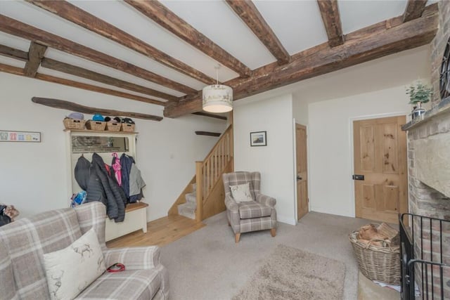 A light oak, hand-crafted staircase is one of the property's features of note.