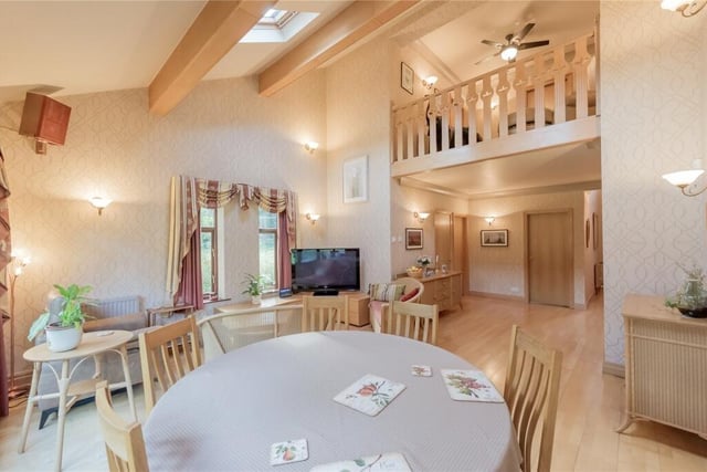 One of the standout features of this property is the super family room with vaulted ceiling and a galleried landing.