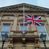 Flag flying half-mast outside Batley Town Hall.