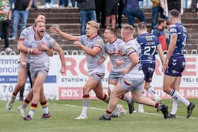 Batley Bulldogs players celebrate at Featherstone Rovers last season. Picture: Neville Wright (www.imagewrights.com)
