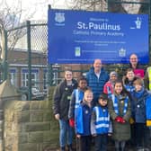 Dewsbury MP Mark Eastwood with pupils from St Paulinus Catholic Primary Academy on Temple Road.