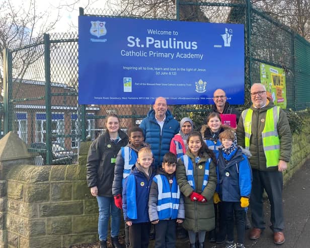 Dewsbury MP Mark Eastwood with pupils from St Paulinus Catholic Primary Academy on Temple Road.