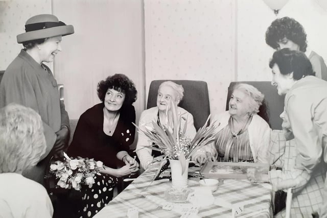 Her Majesty Queen Elizabeth II with Claremont House residents.