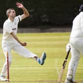 Brad Schmulian took five wickets for Woodlands against Ossett to help his side to the top of the Bradford League.