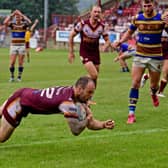 Dale Morton flies over for Batley Bulldogs in their precious win over Whitehaven on Sunday.