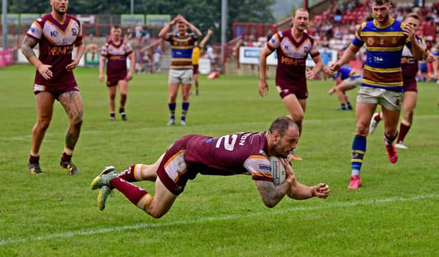 Dale Morton flies over for Batley Bulldogs in their precious win over Whitehaven on Sunday.