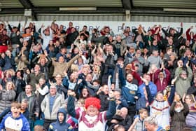 Batley Bulldogs fans celebrate the club's Championship play-off semi-final victory at Featherstone Rovers. Now Chief Executive, Paul Harrison, wants the 'whole of Batley' to cheer the side on in the Million Pound Game at Leigh Centurions on Sunday.