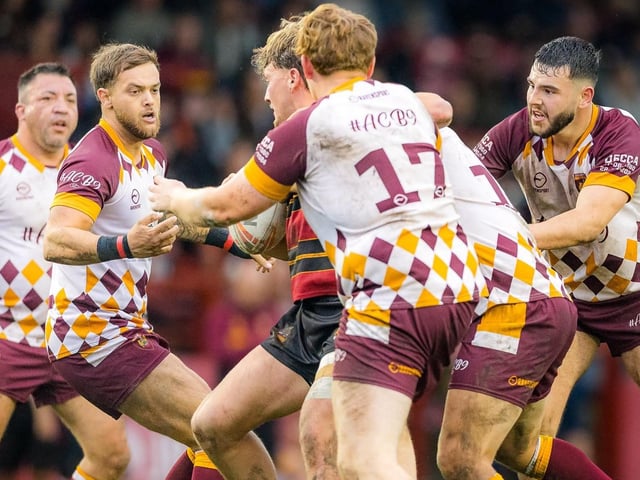 Action from the Dewsbury Moor Maroons A final against Shaw Cross Sharks A.
