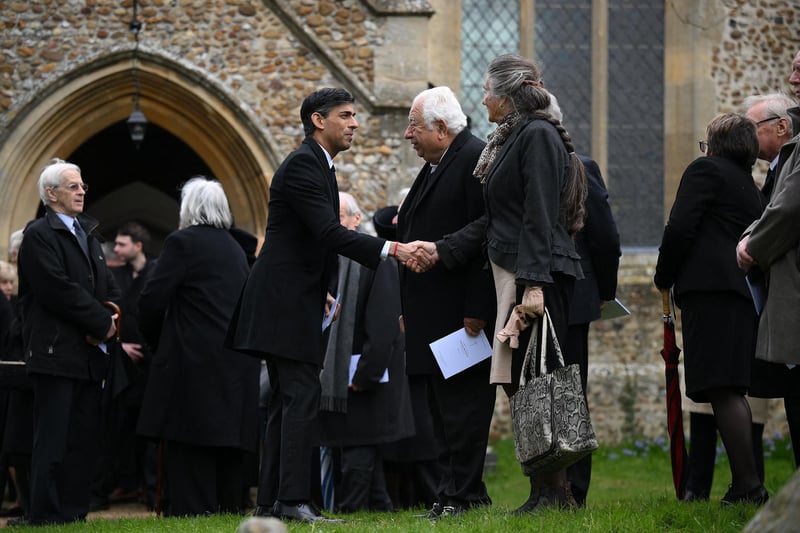 Prime Minister Rishi Sunak speaks with mourners as he leaves after attending the funeral of former Speaker of the House of Commons, Betty Boothroyd