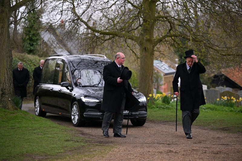 The hearse carrying the coffin of former Speaker of the House of Commons, Betty Boothroyd, arrives at St George's Church in Thriplow, near Cambridge, ahead of her funeral service