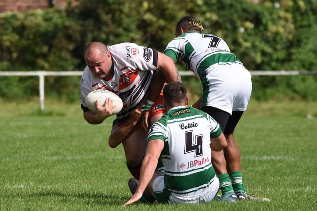 Stu Biscomb powers forward for Normanton Knights.