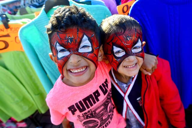Zain Zaheer and Abdullah Mobeen with their faces painted.