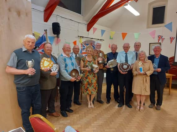 Trophy winners at Dewsbury Photographic Group's annual awards dinner. Pictured from the left are Terry Etherington, Jim Bowman, Peter Norton, Frank Lodge, Melissa J Harvey, Nigel Booth, John Ketton, Paul Ketton, Paul Harrison, Sally Mastronardi and Mike W Brown