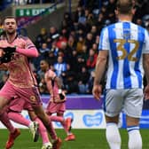 Patrick Bamford celebrates his goal for Leeds United at Huddersfield Town.